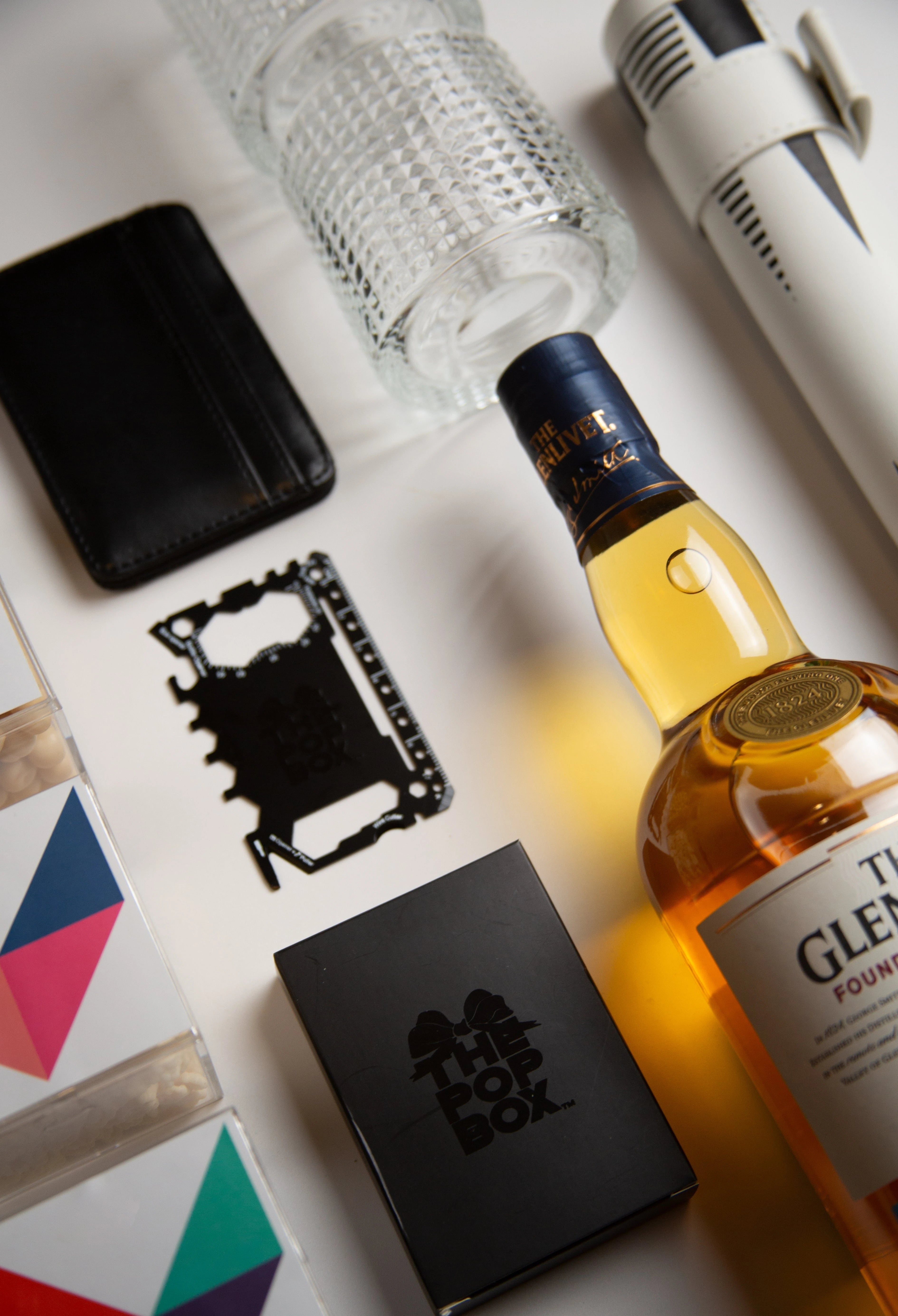 Luxury men’s gift box with curated essentials, indulgences, and thoughtful keepsakes from The Pop Box